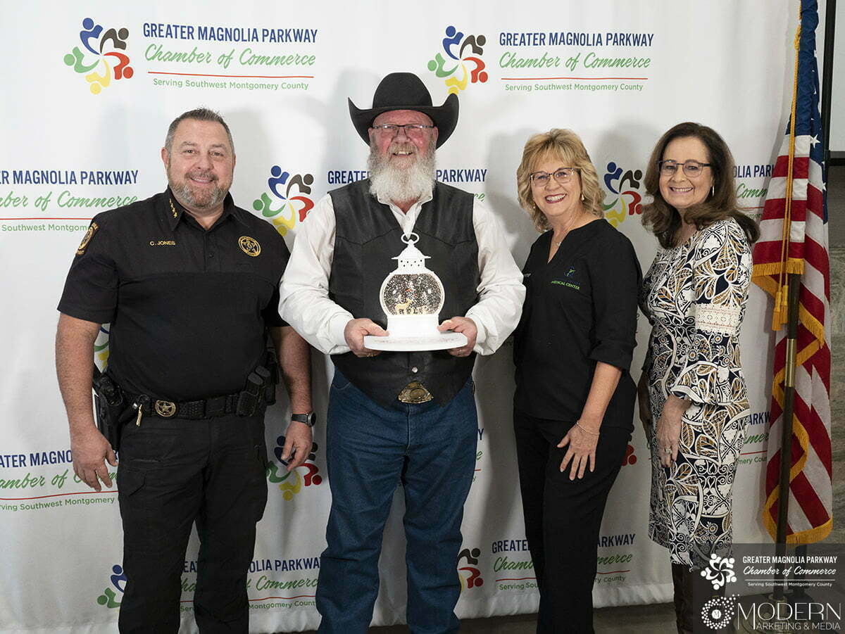 Grand Champion Santa Award presented to Montgomery County Fair Assn, trophy sponsored by Quality of Life Medical Center, presented by Constable Chris Jones and Commissioner Charlie Riley.